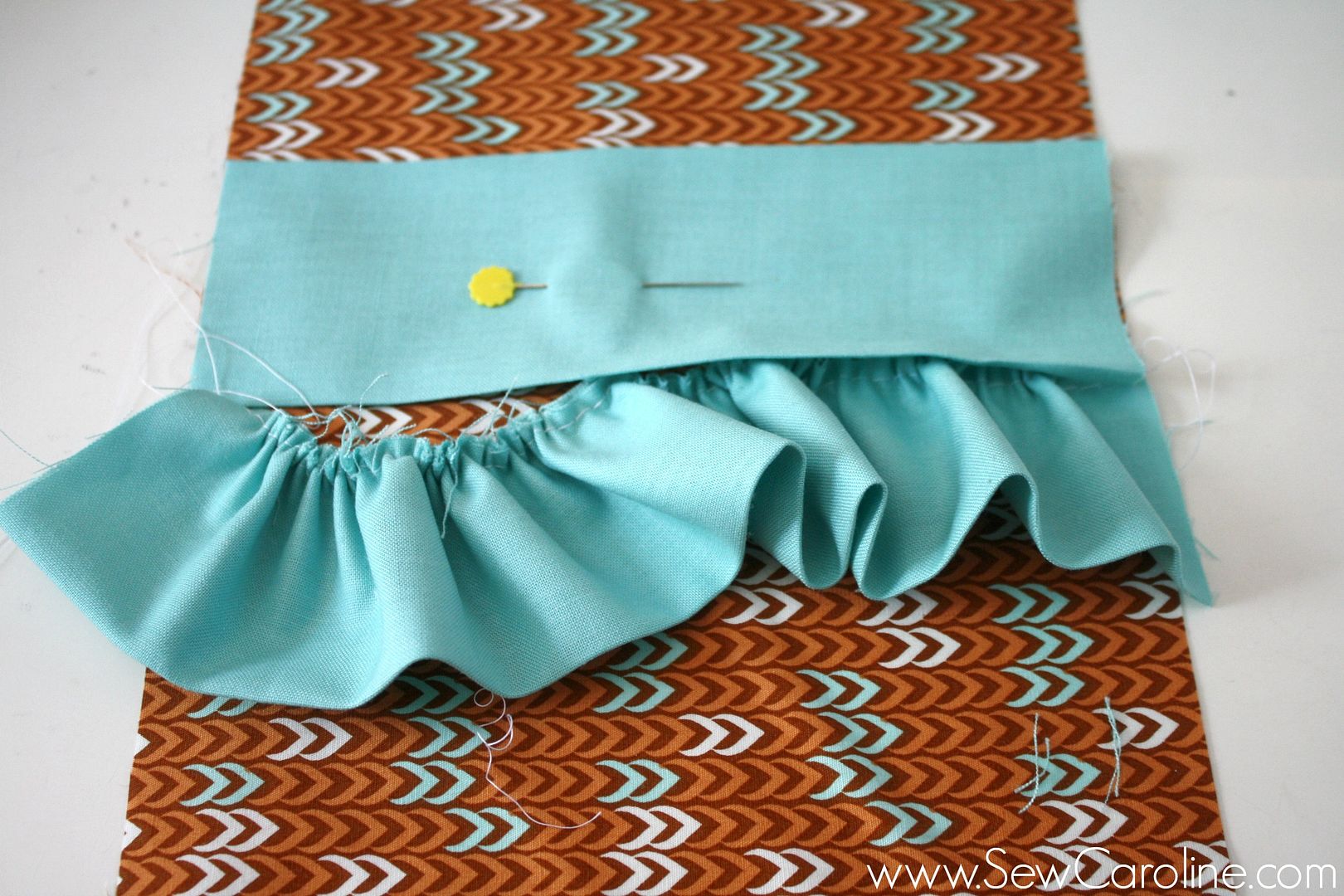 ruffled fold-over clutch tutorial // sewcaroline.com on seekatesew.com 