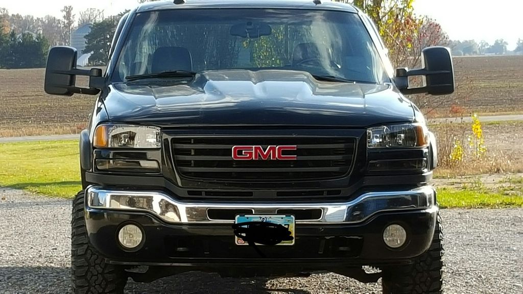 0106 Gmc Sierra custom and aftermarket headlights/Tailights whatcha
